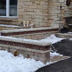 Brick Paver Front Porch with Decorative Brick Wall Thiensville